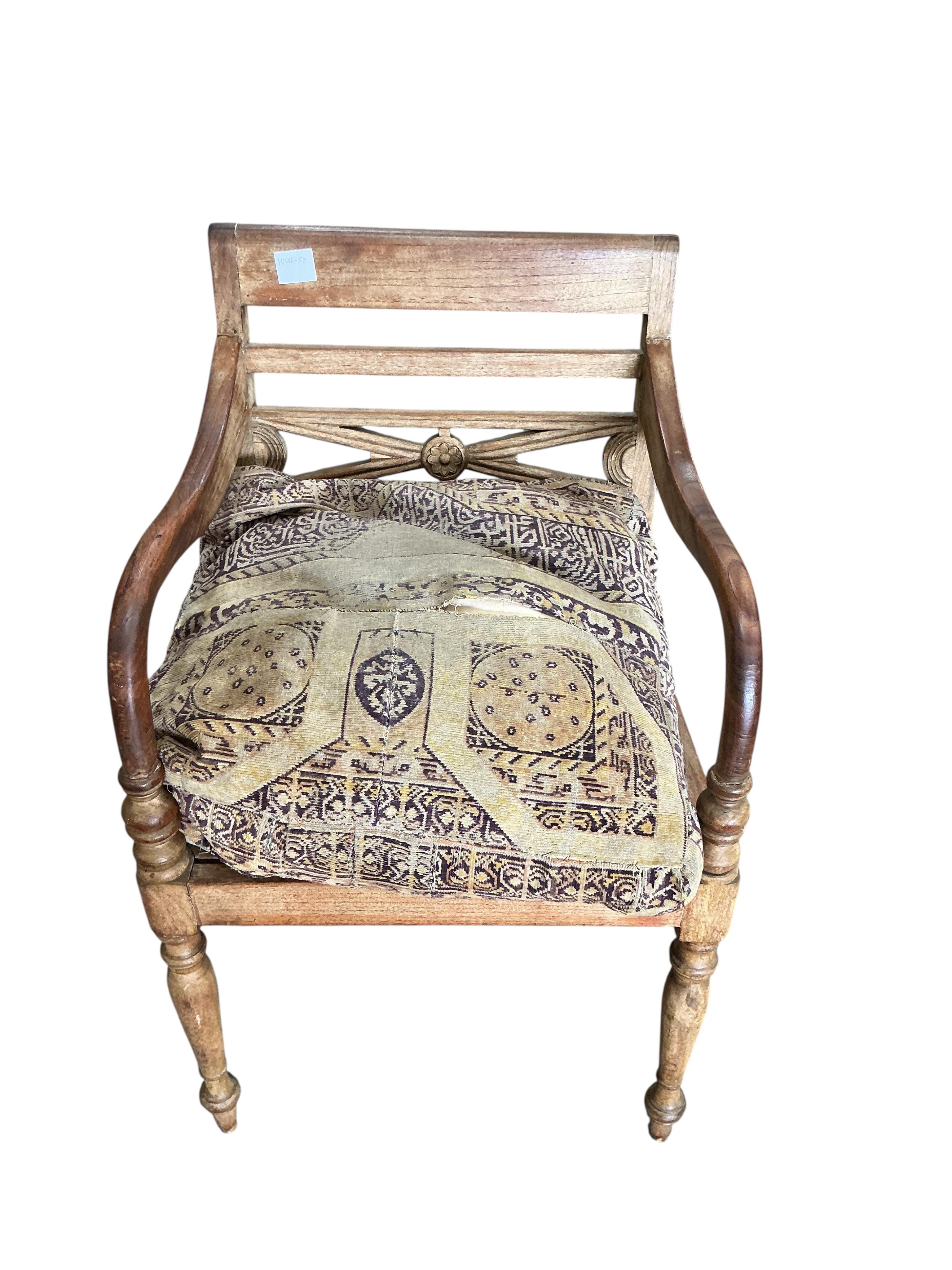 An Anglo-Indian hardwood elbow chair, width 53cm, height 84cm